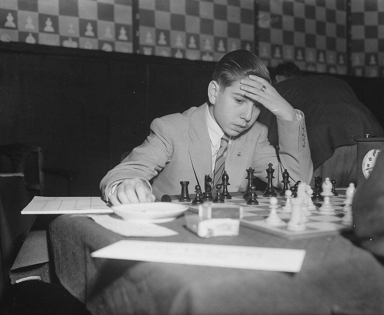 Arturo Pomar as a teenager at the board, photographed at the Baarn tournament of 1947